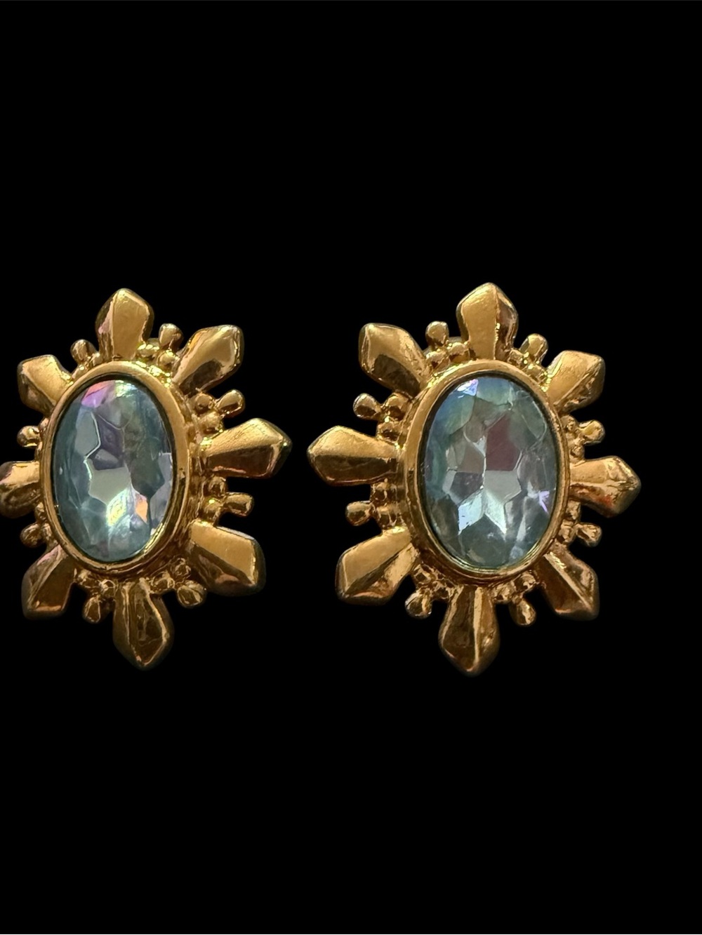 Avon Gold Tone Starburst Stud Earrings with Blue Iridescent Stones